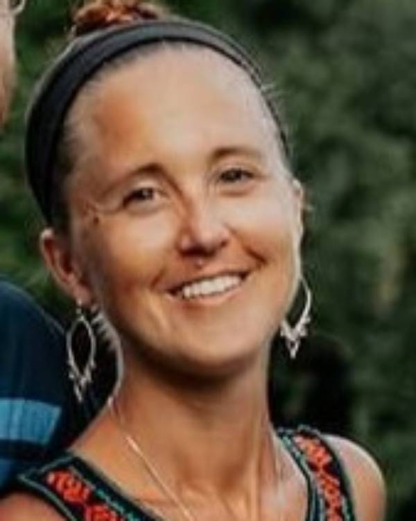 Smiling person outside
