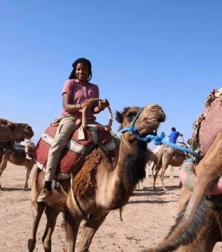 EMU Cadet riding camel in Morocco