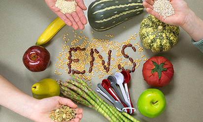 A photo of veggies and beans spelling out ENS.