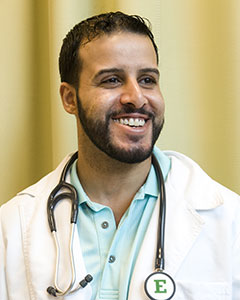 A smiling male nursing student.