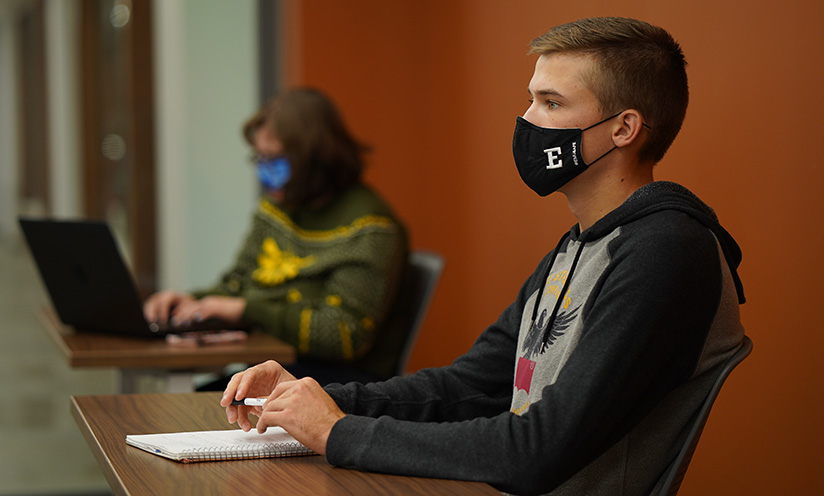 A photo of EMU students in class wearing masks.