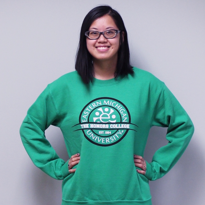Photo of student wearing green sweatshirt