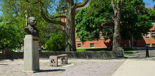 EMU campus courtyard with MLK statue