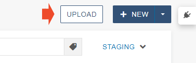 A close-up screenshot of the upload button in Omni CMS.